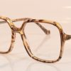 Enrico Coveri 601 | Brown | Side | Designer Glasses | Faversham Optical