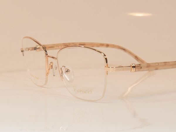 Ferucci 1824 supra style spectacles in rose gold with plastic sides.